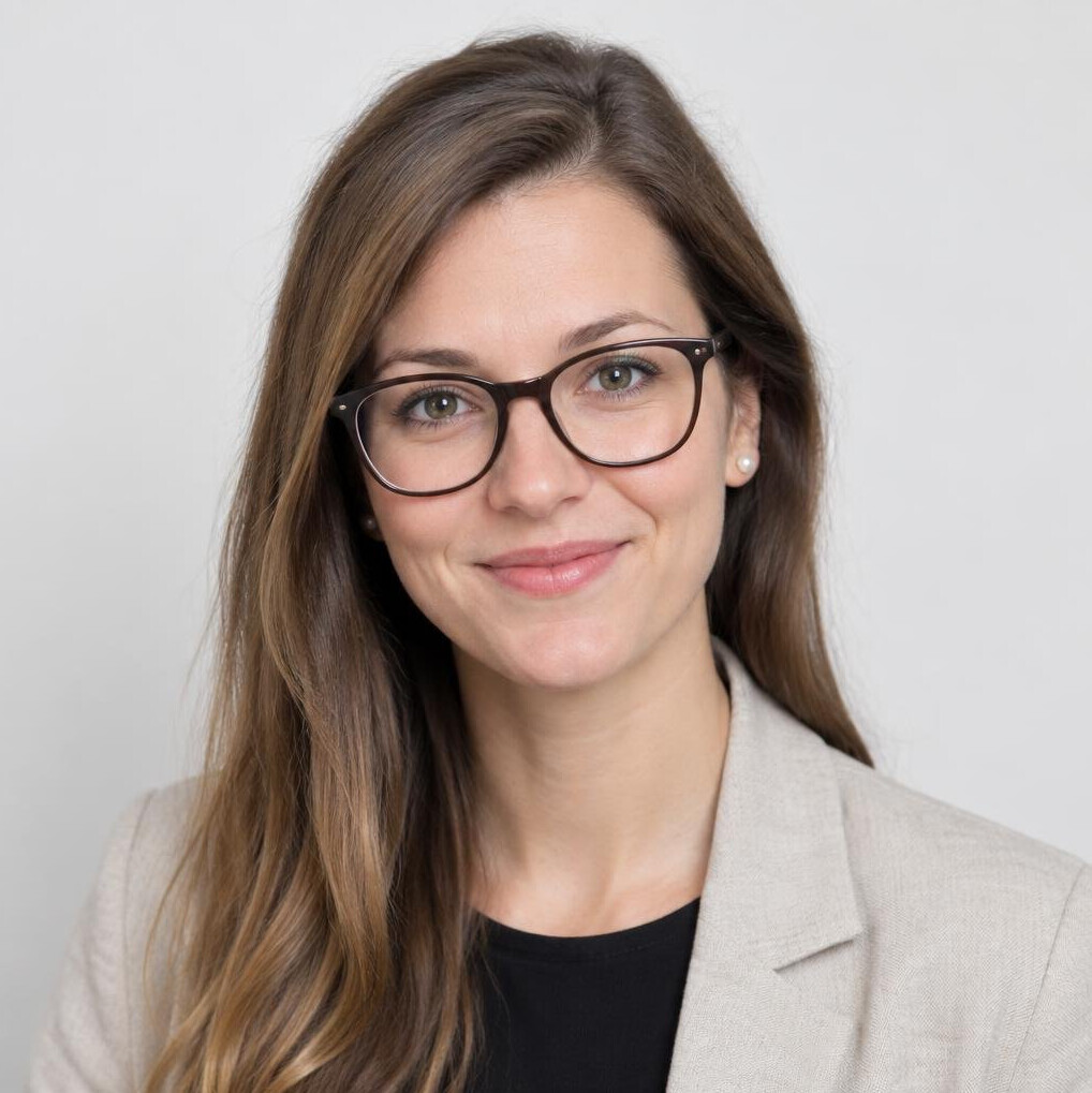 Portrait of a smiling young Slovenian woman with glasses